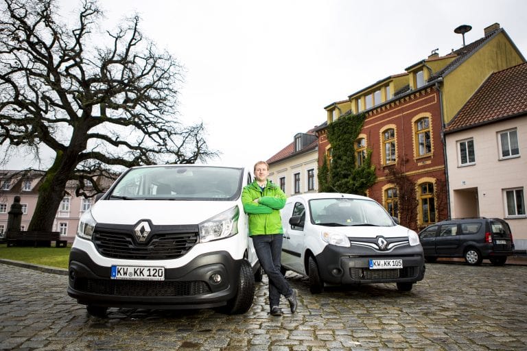 A vehicle fleet manager with his fleet