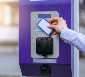 An employee practicing fleet management fuel consumption with a fuel card