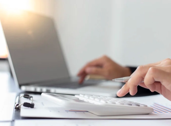 An employee with a Van Tracker Systems doing their taxes